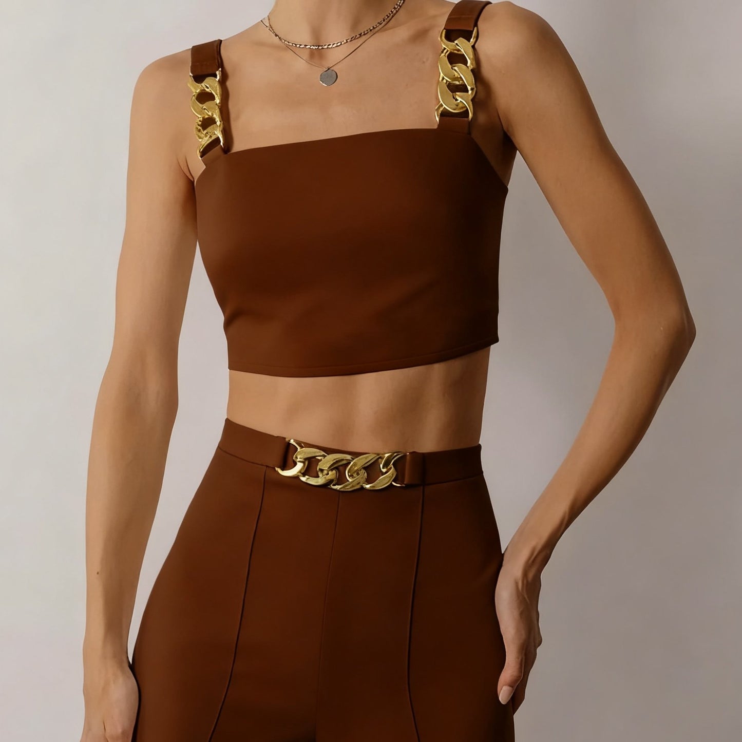 Elegant Black Two-Piece Set with Golden Chain Straps