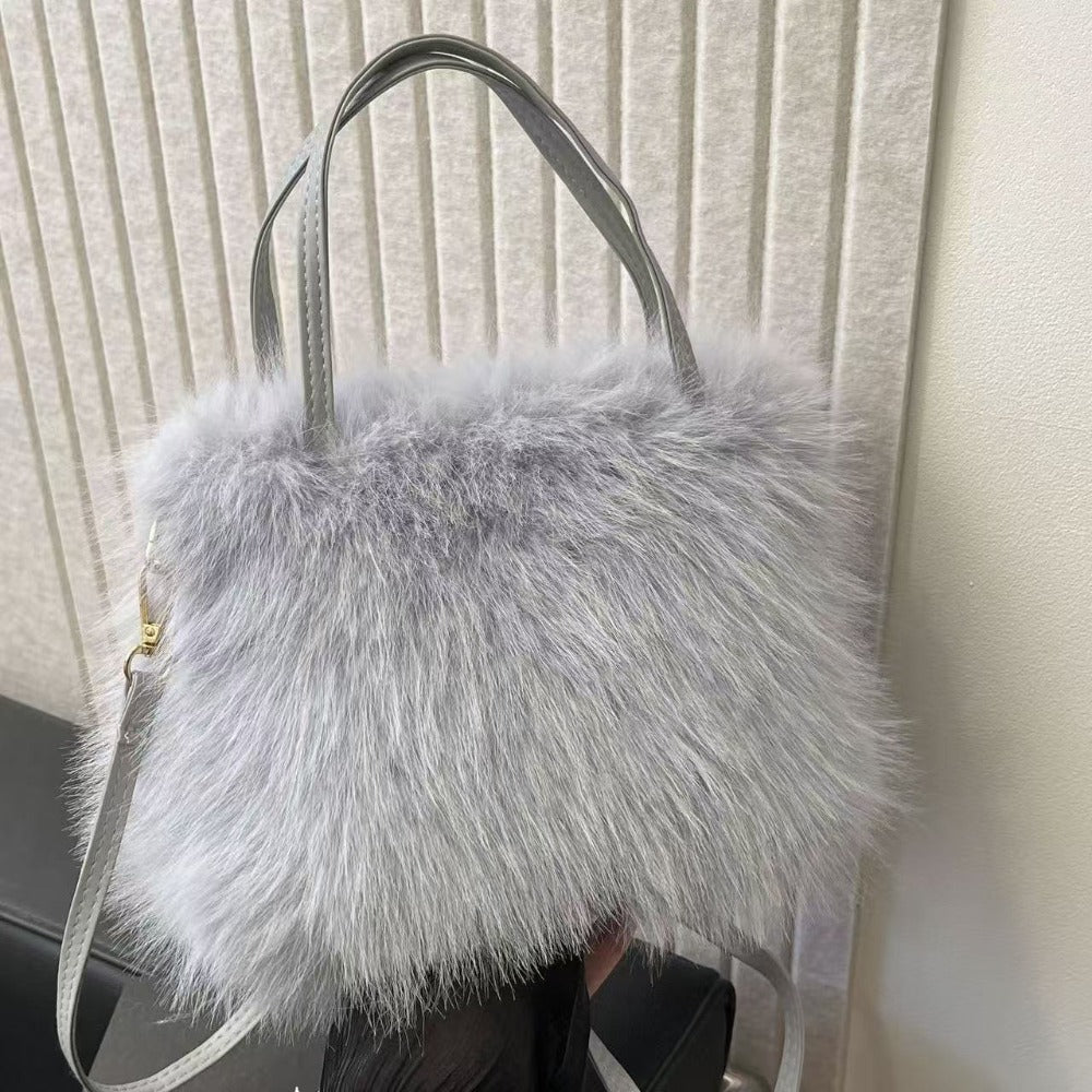 A Plush Women'S Shoulder Bag, a Stylish Autumn And Winter Hand-Held Bucket Crossbody Fur Bag, a Versatile Solid Color Faux Fox Fur Large Capacity Tote Bag, Available in Six Colors Suitable for Daily Commuting, Parties, Christmas, Thanksgiving, And Halloween.